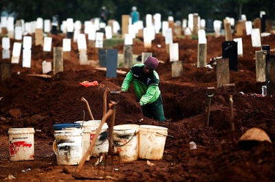 In Indonesia's Java, Punishment for Not Wearing Masks is Digging Graves for Covid-19 Victims