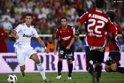 La Liga: Madrid top with Malaga win, Barca win