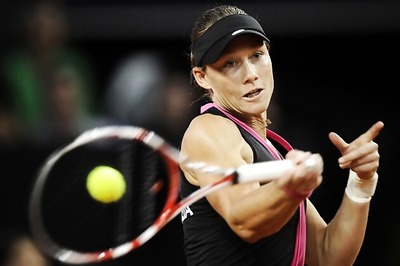 Stosur stunned by Zheng Jie in second round