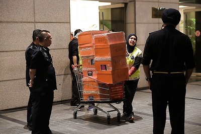 Cash-Filled Designer Handbags Seized in Raids on Malaysia's Najib