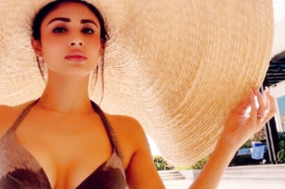 Sexy! Mouni Roy Oozes Oomph In Brown Bikini As She Flaunts Her Curves; See Hot Photos