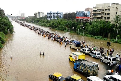 Two Men Claim They Survived Open Manholes on Flooded Streets in Mumbai