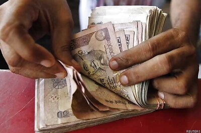 Rupee gains 15 paise against US dollar