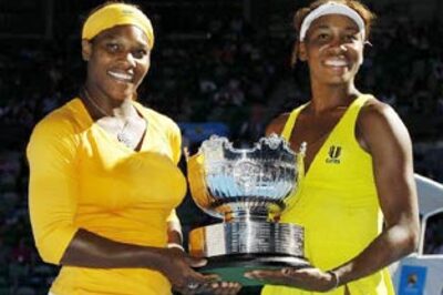 Serena, Venus lift Australian Open doubles