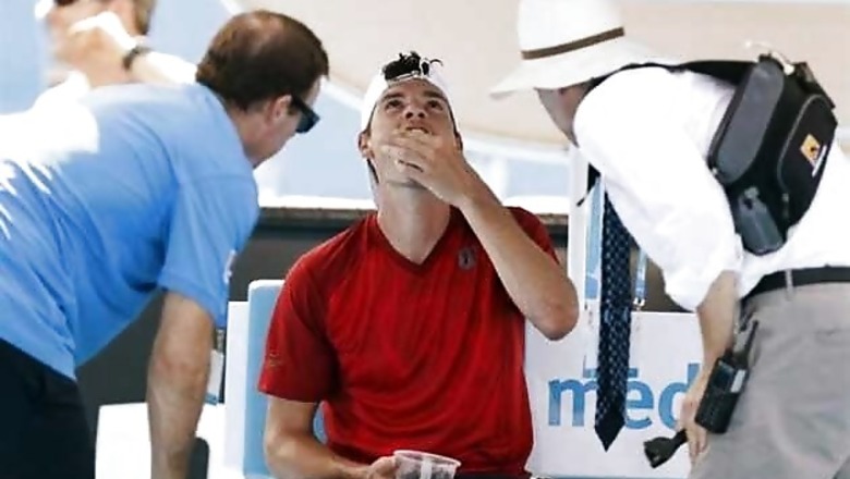 Dancevic, ball boy faint as heat spikes in Australian Open