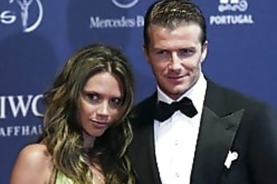 Beckham spotted groping Posh's bum