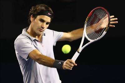 Federer, Serena storm into quarter-finals