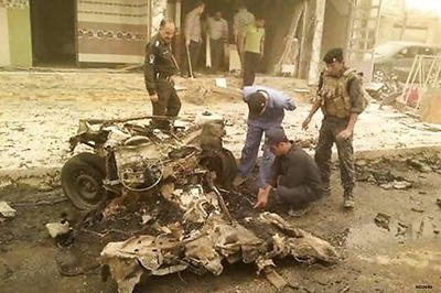 At least 36 killed in wave of Iraq blasts