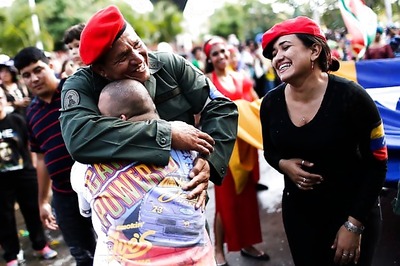 Venezuela marks anniversary of Chavez's death with pomp and protests