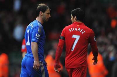 Luis Suarez bites Ivanovic's arm, apologises
