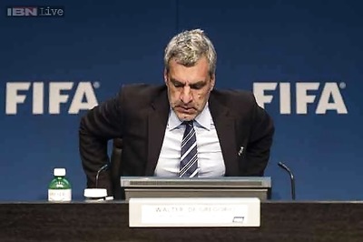 FIFA's top spokesman leaves job, Blatter urged to do same
