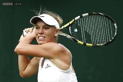 Wozniacki, Lisicki storm into second round of Wimbledon