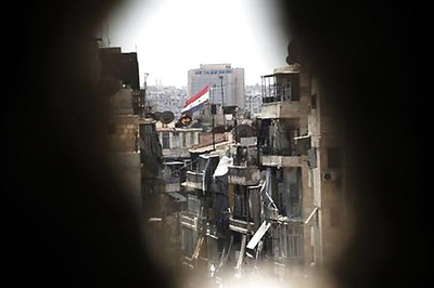 G8 urges Syria peace talks as fighting flares in north