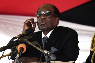 Robert Mugabe Threatens to Sack V-P After Wife Booed at Rally