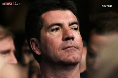 Simon Cowell touched by 'incredible' public support