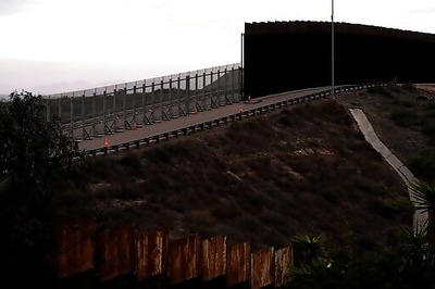 Biden Asks High Court To Put Off Wall, Asylum Cases