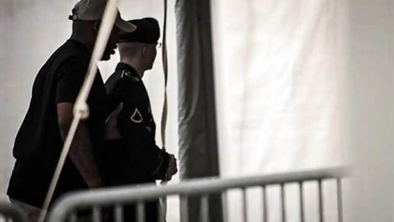 Military judge cuts potential sentence for WikiLeaks soldier Bradley Manning