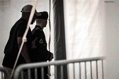 Military judge cuts potential sentence for WikiLeaks soldier Bradley Manning