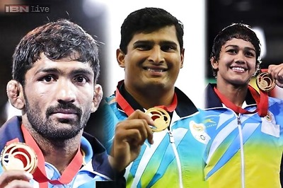 CWG 2014: Vikas Gowda, wrestlers lead India's gold rush on Day 8