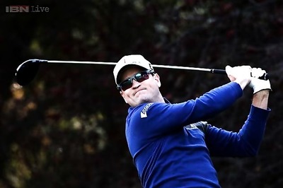 Competitive Johnson outduels Tiger Woods at Sherwood