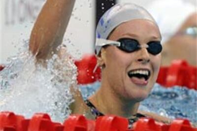 Italy's Pellegrini breaks 200m freestyle world record