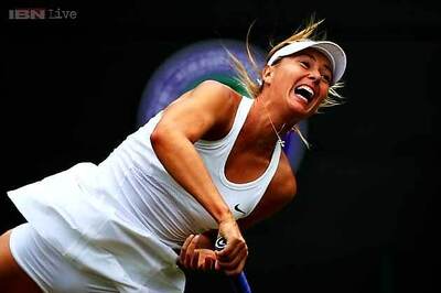 Ruthless Sharapova continues smooth progress at Wimbledon