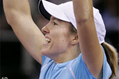 Sharapova ousted, Henin's new No 1