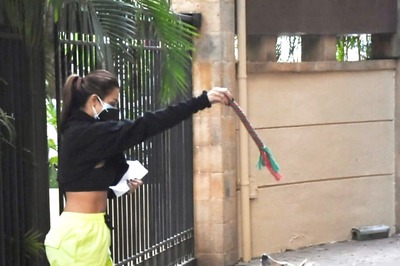 Malaika Arora Gives A Sexy Spin To Turtlenecks; Flashes Toned Midriff While Playing With Her Dog