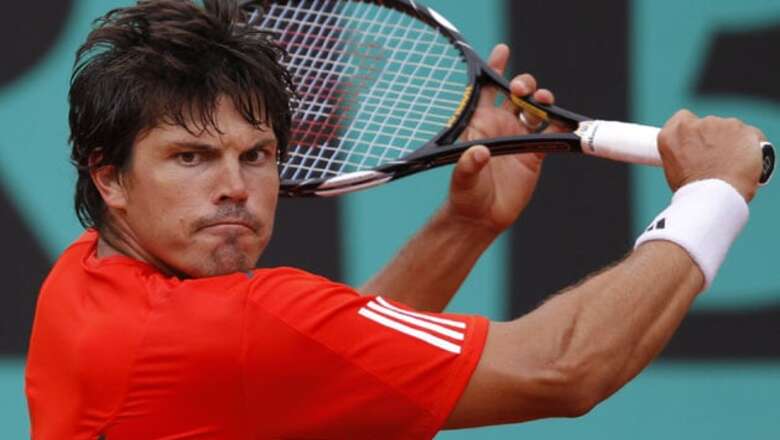 Dent upsets Lopez, sets up meeting with Nadal