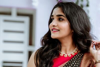 Actress Divya Uruduga Looks Stunning In Black Embellished Silk Saree