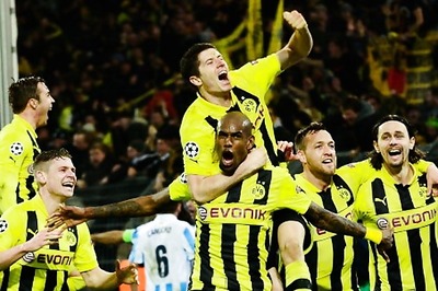 Borussia Dortmund beat Malaga 3-2 to enter Champions League semis