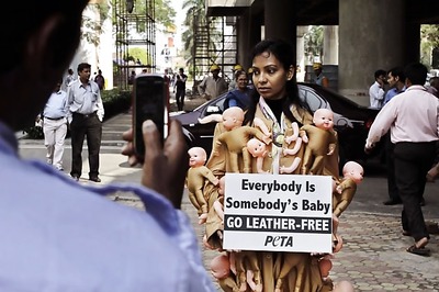 Snapshot: PETA's coat festooned with baby limbs