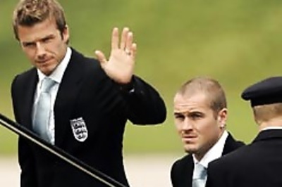 Beckham and boys land in Germany