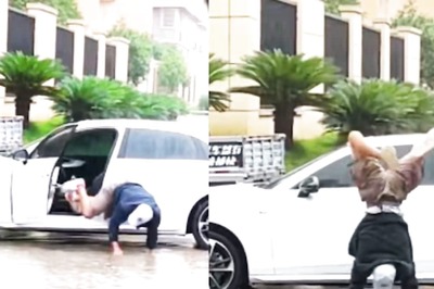 Watch: Man Walks On His Hands In Waterlogged Street To Saves His Shoes