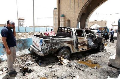 Suicide bomber kills 14 at camp for Iraq displaced