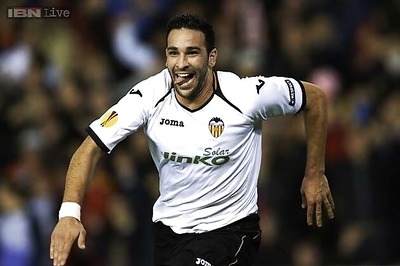 Valencia negotiating with AC Milan for Adil Rami loan