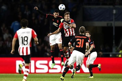 Manchester United lose 2-1 to PSV Eindhoven, Shaw to broken leg in Champions League