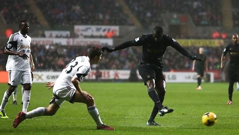 Manchester City stay on course with 3-2 win over Swansea