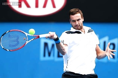 Gulbis upsets Tsonga to win Open 13 title