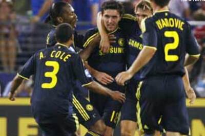 Zhirkov's debut goal sees Chelsea past Milan