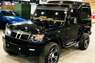 This Modified Mahindra Bolero Invader with Black Paint Looks Barely Recognizable