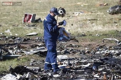 Russian TV channel says photos show MH17 shot down by fighter jet