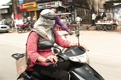 Delhi: Nearly 60,000 women two-wheeler riders fined for not wearing helmets