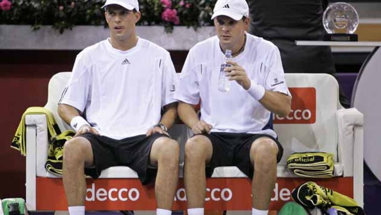 Bryan brothers advance at US Open