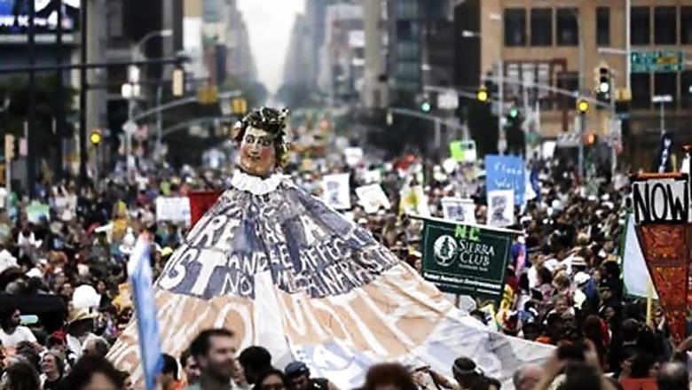 UN chief, Leonardo join thousands at rally on climate change