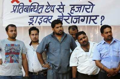 Taxi firm Ola cleared to operate in New Delhi, Uber goes to court