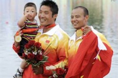 China adds canoe gold to Beijing treasure trove