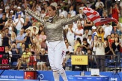 Fencer Zagunis wins first gold for US