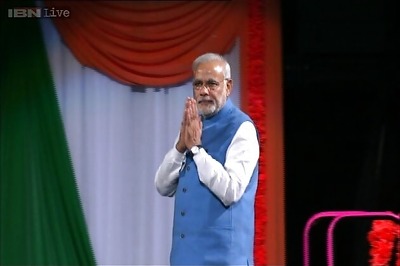 Modi arrives in Canberra, summit talks with Tony Abbott on Tuesday