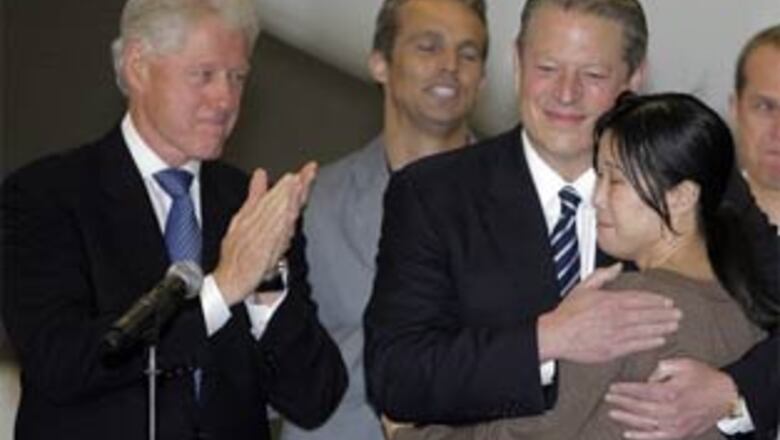US journalists freed by N Korea return home
